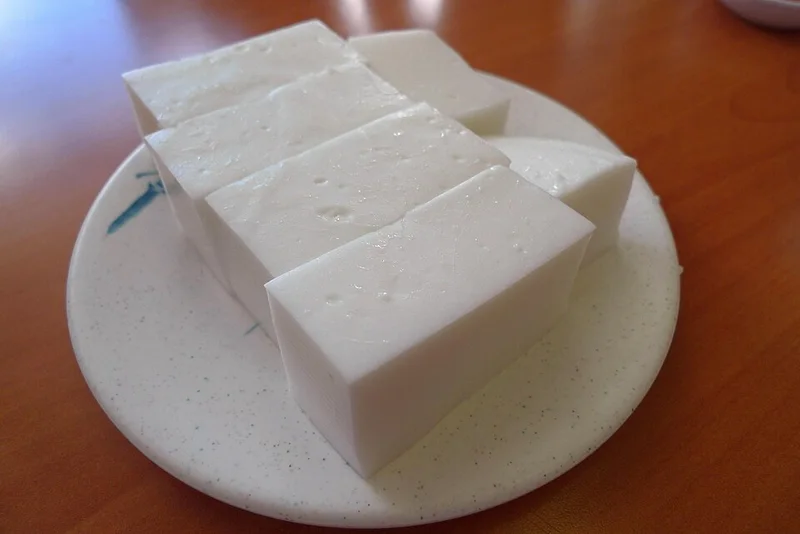 White haupia squares on a plate.